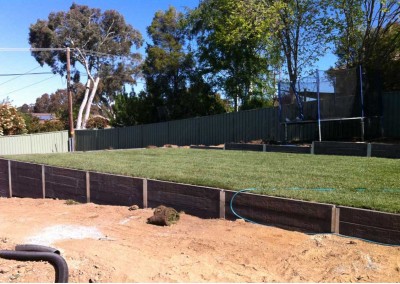 Concrete sleepers, hardy grass and landscape in progress