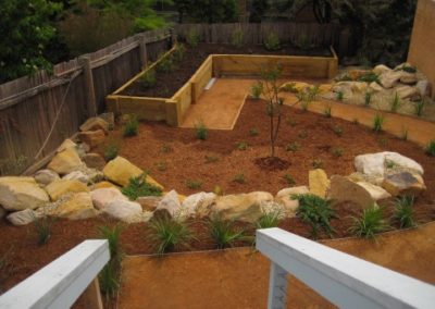 Looking down from steps to landscaped garden