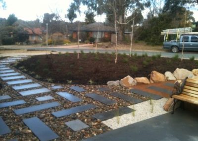 Pavers set in river pebbles